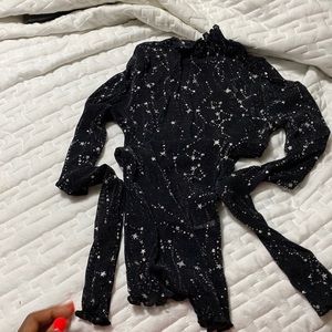 It's sheer, navy blue shirt